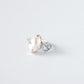 Ring mit Perle und blauem Topas