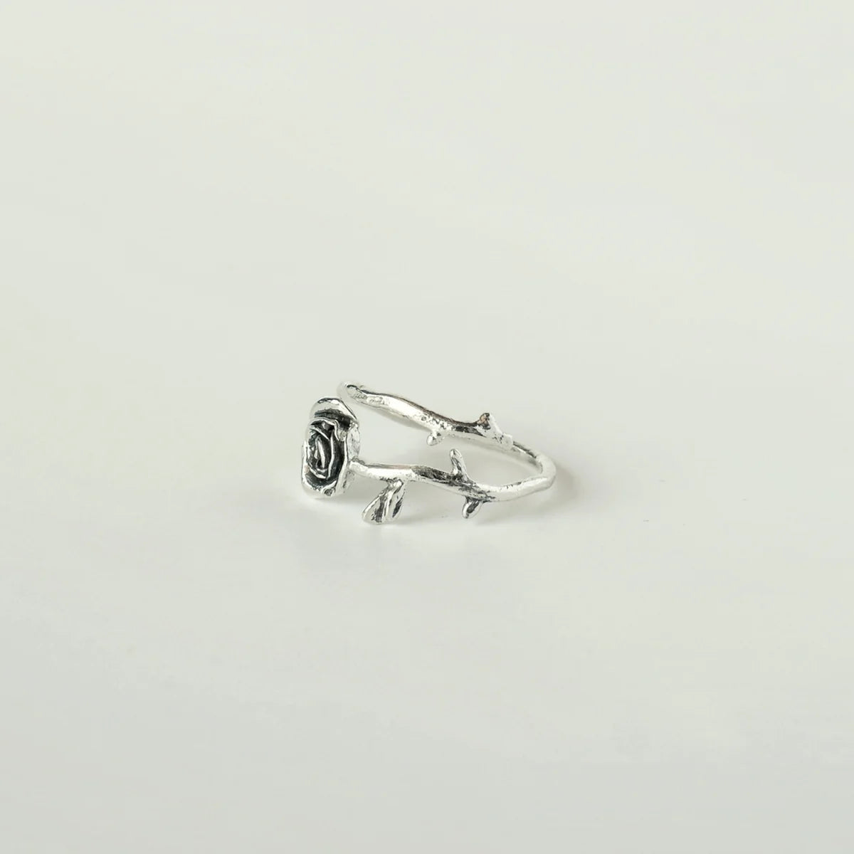 Troianda Koliucha handmade 925 sterling silver rose ring, angled view