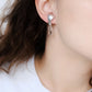 Earrings "I hugs your ear" limpid